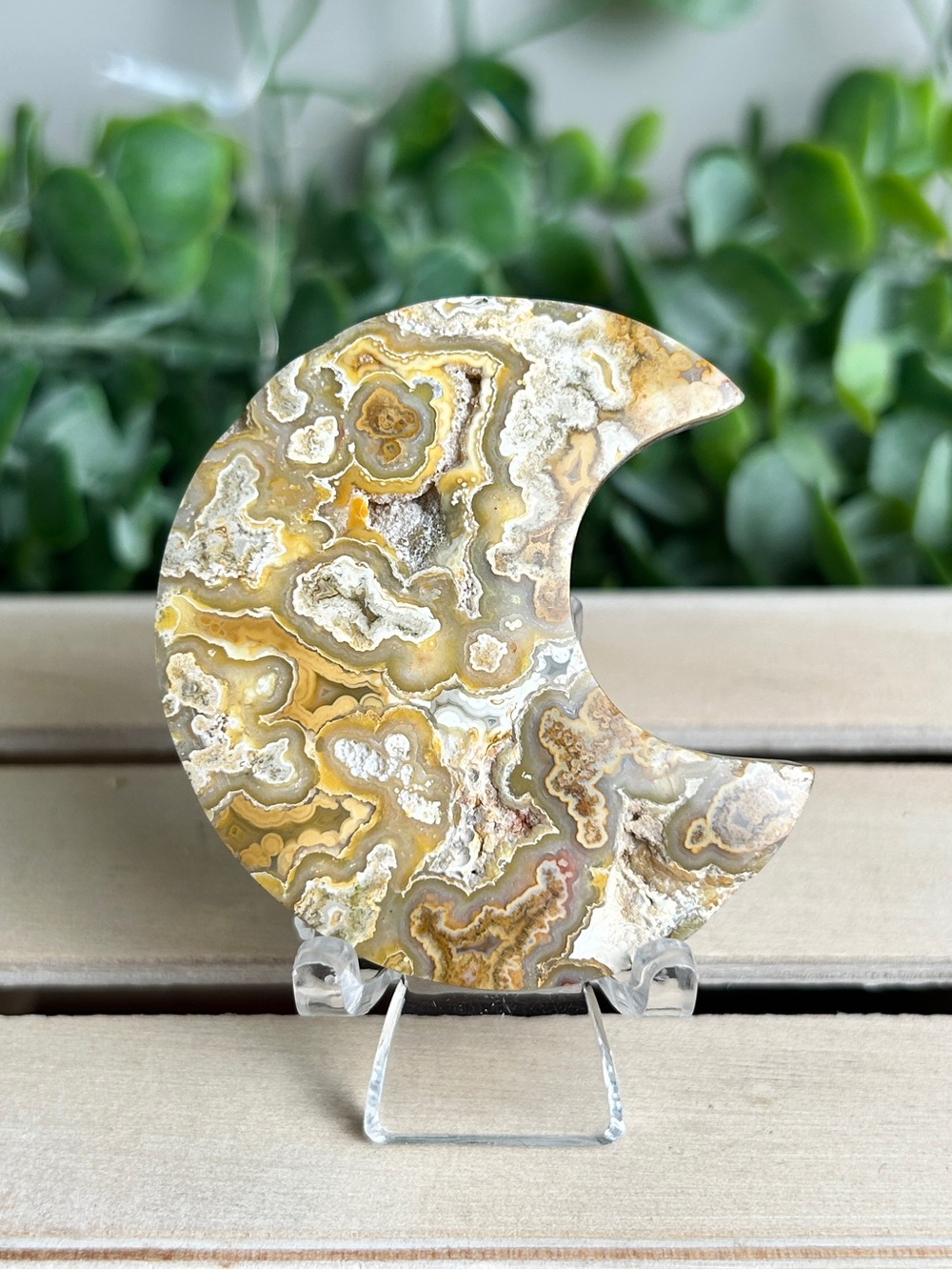 Polished Yellow Crazy Lace Agate Crescent Moon Carving
